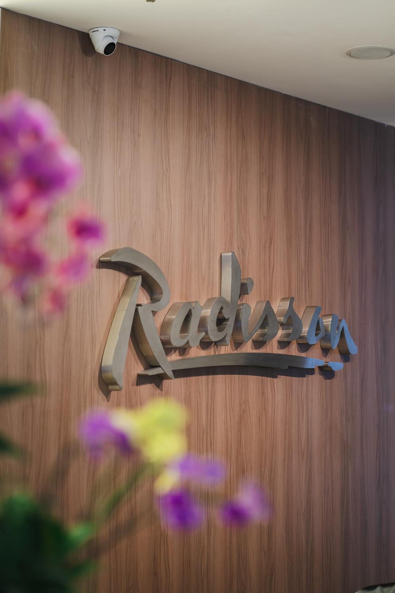 ホテル Radisson Rio De Janeiro Barra エクステリア 写真 The logo of the resort